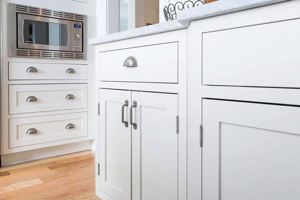 An Example Of Inset Cabinetry With Visible Hinges